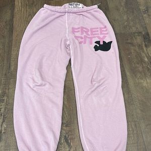 Mauve pink freecity sweats new has discoloration on right leg